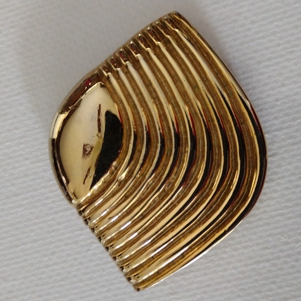 Lady Remington faux gold scarf clip brooch.